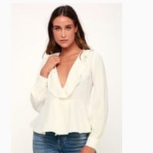 White ruffle blouse